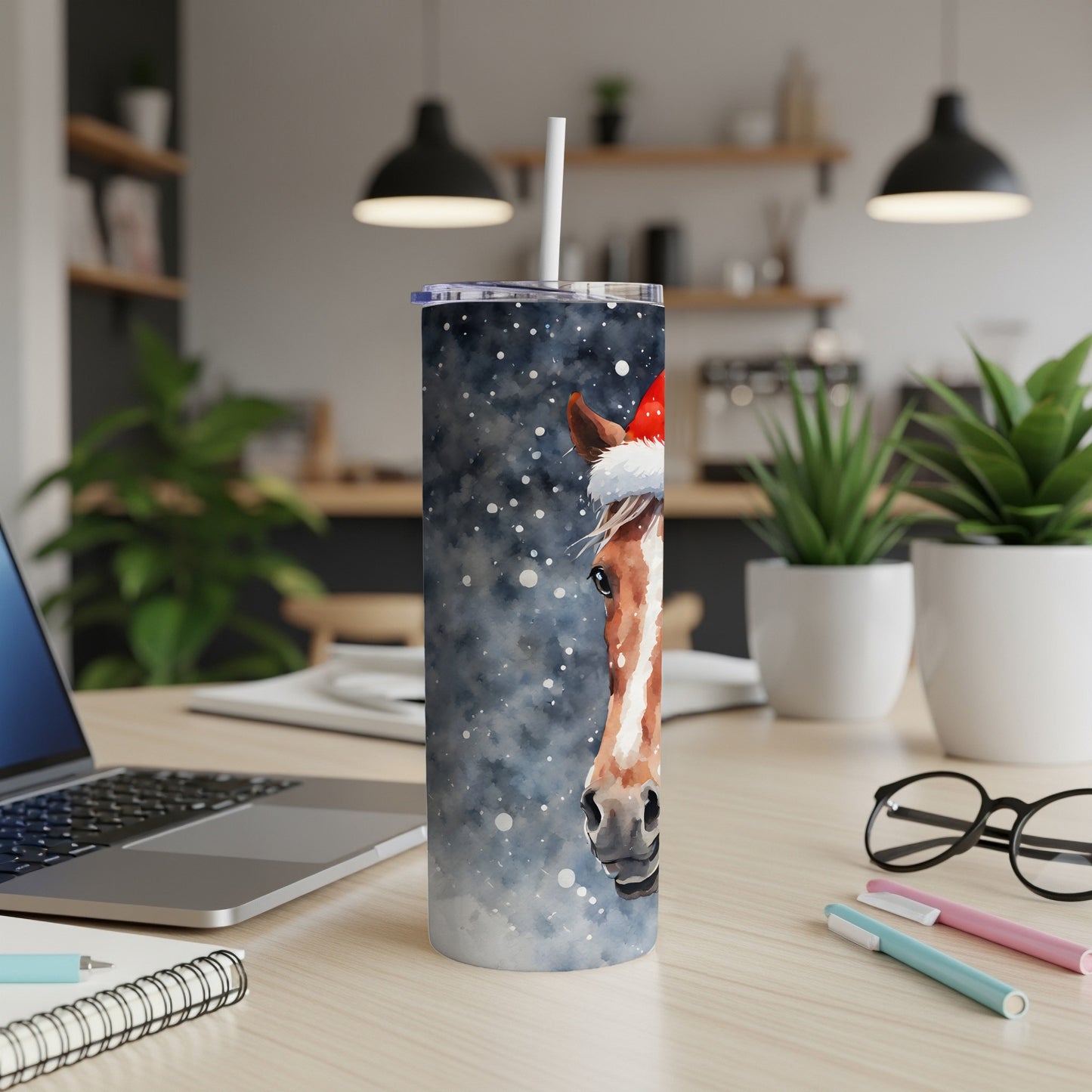 Horse wearing Santa hat on a speckled tumbler.