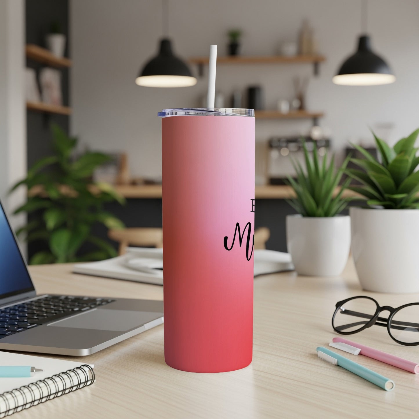 Pink gradient tumbler with "Mom" text and a straw.