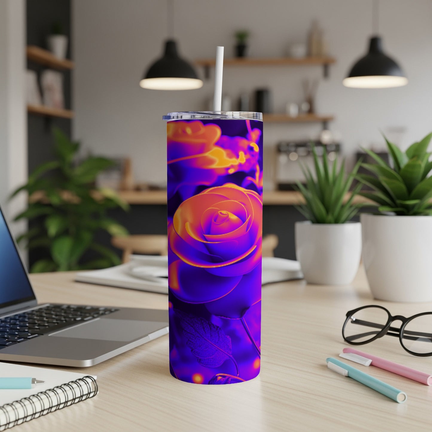 Thermal rose design on a white skinny tumbler with straw.