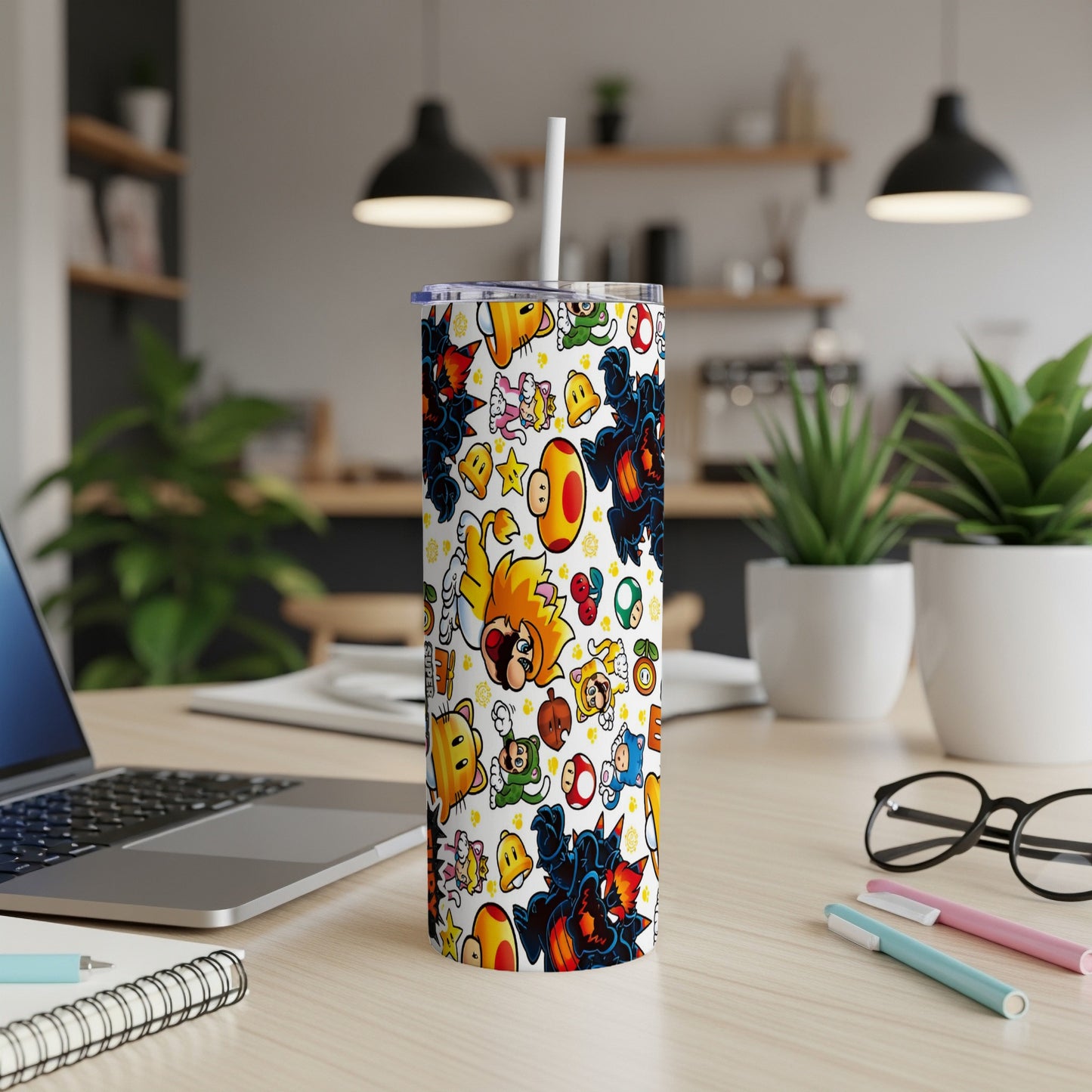 Mario characters and power-ups on a white tumbler with a straw.