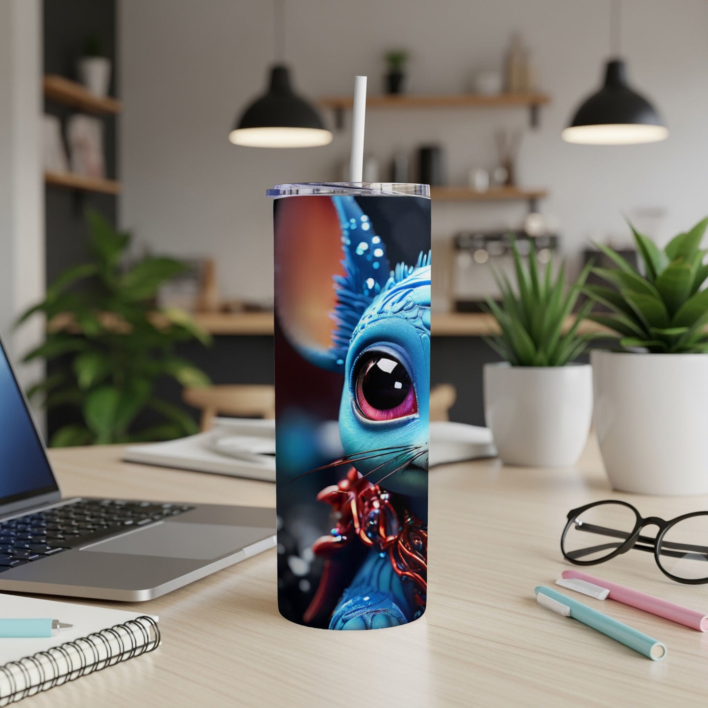Blue cartoon creature with large eyes on a tumbler.