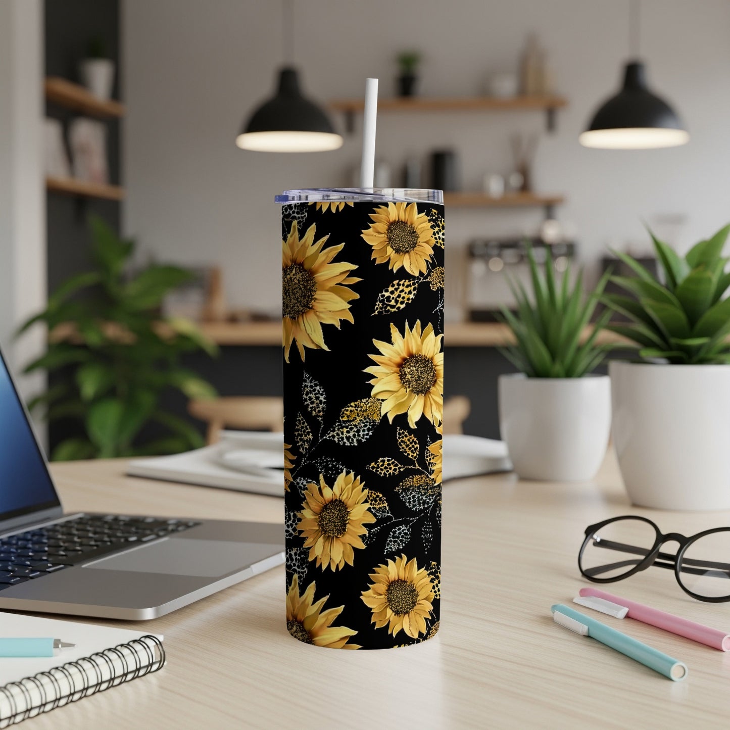Black tumbler with sunflowers and leopard print design.