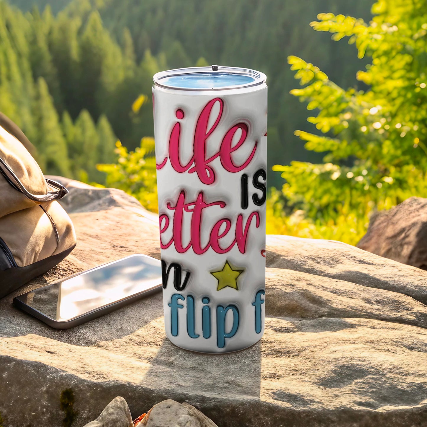 Tumbler with "Life is better in flip flops" text and star design.
