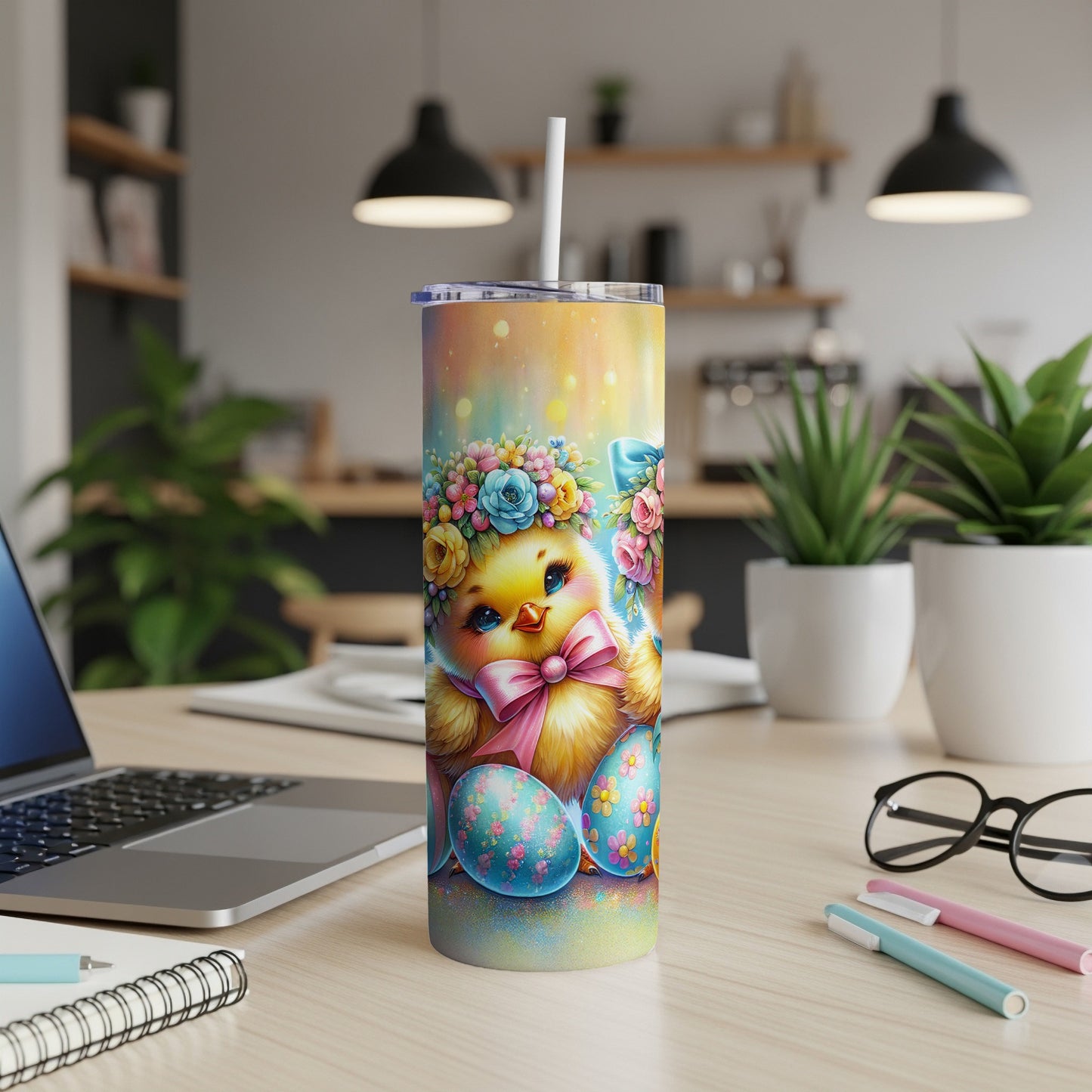 Easter chick with floral crown and decorated eggs on a tumbler.