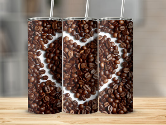 Three tumblers with coffee beans arranged in a heart shape.
