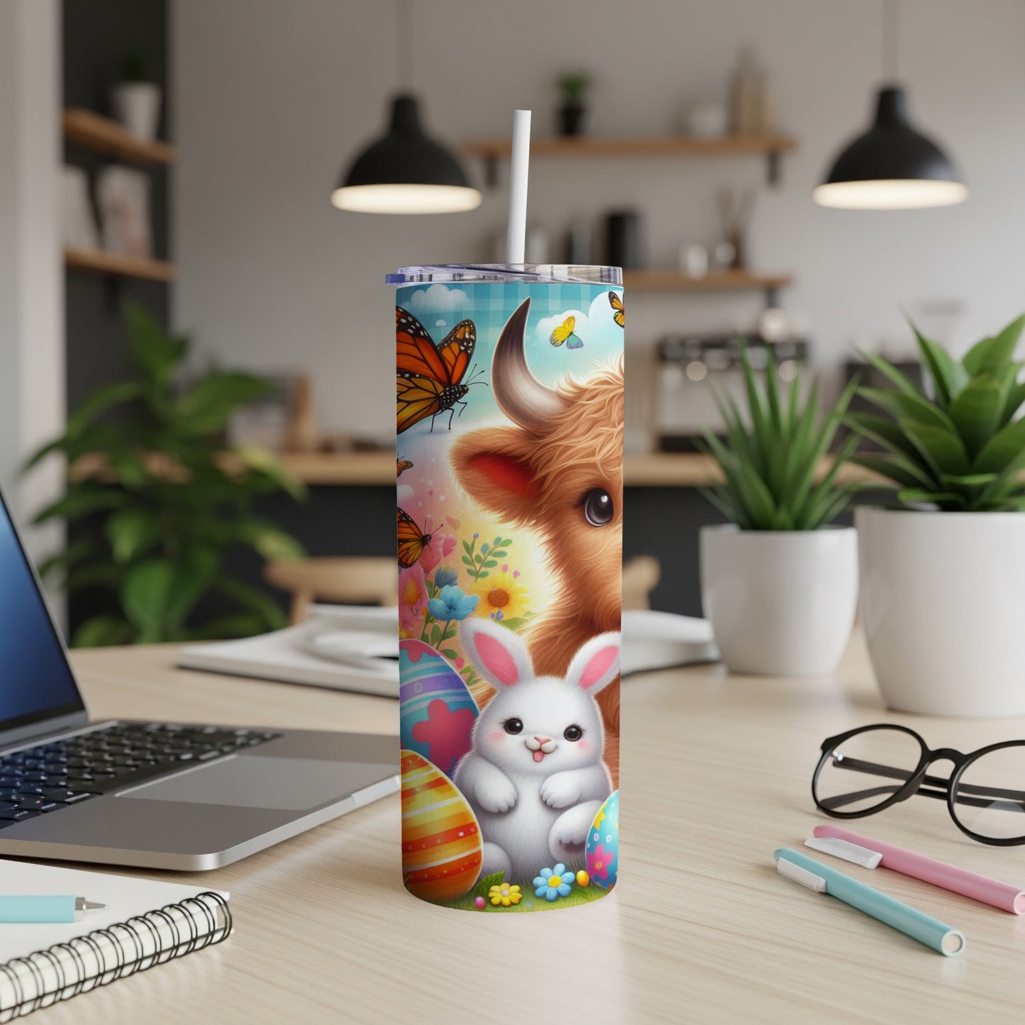 Easter bunny and cow with butterflies and flowers on a tumbler.