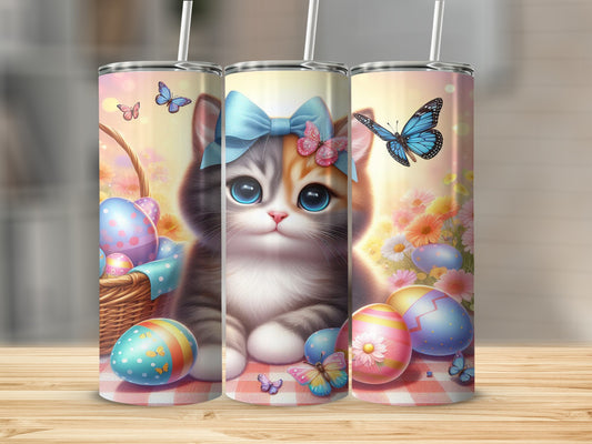 Kitten with Easter eggs and butterflies in a basket.