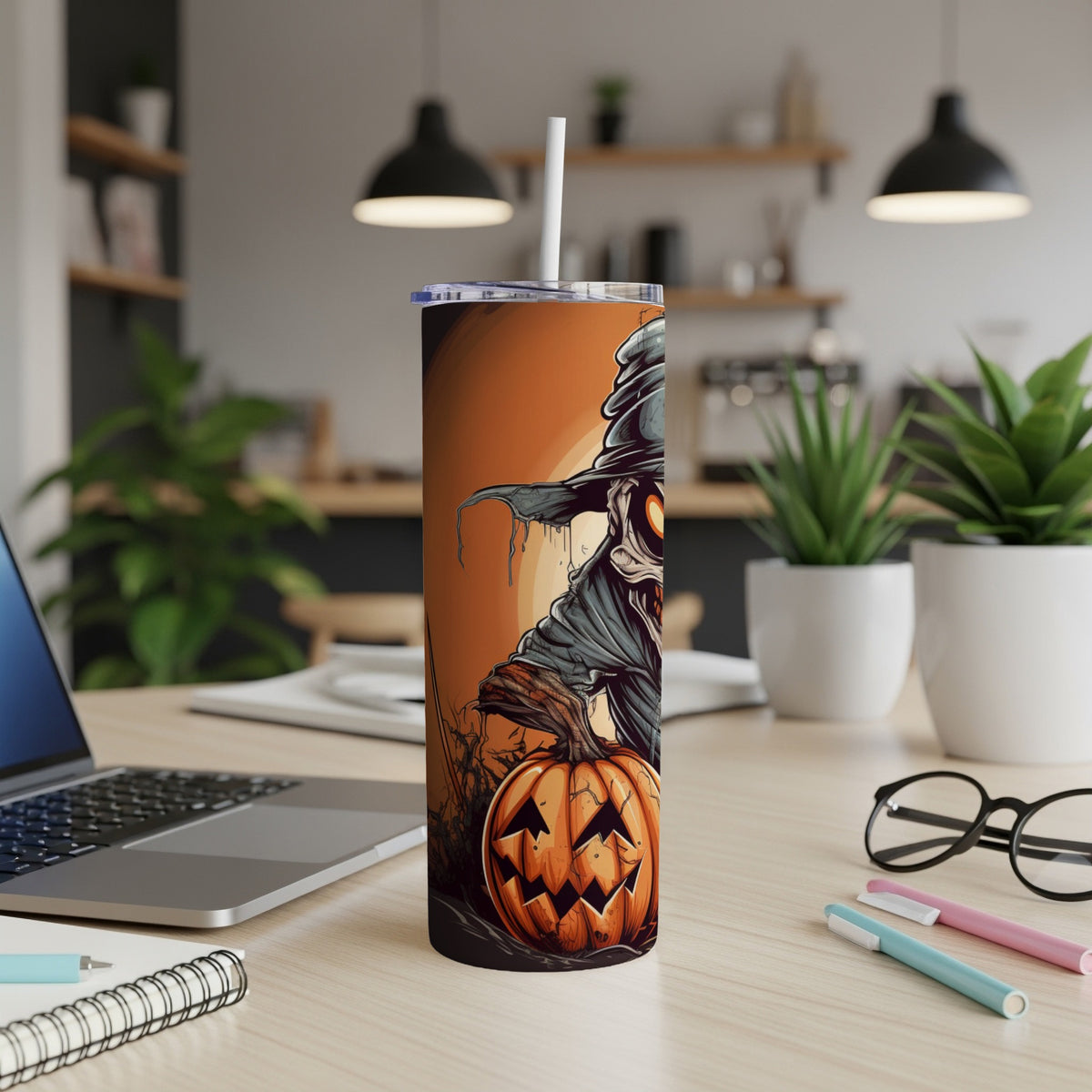 Tall tumbler with a spooky witch and Jack-o'-lantern Halloween design.