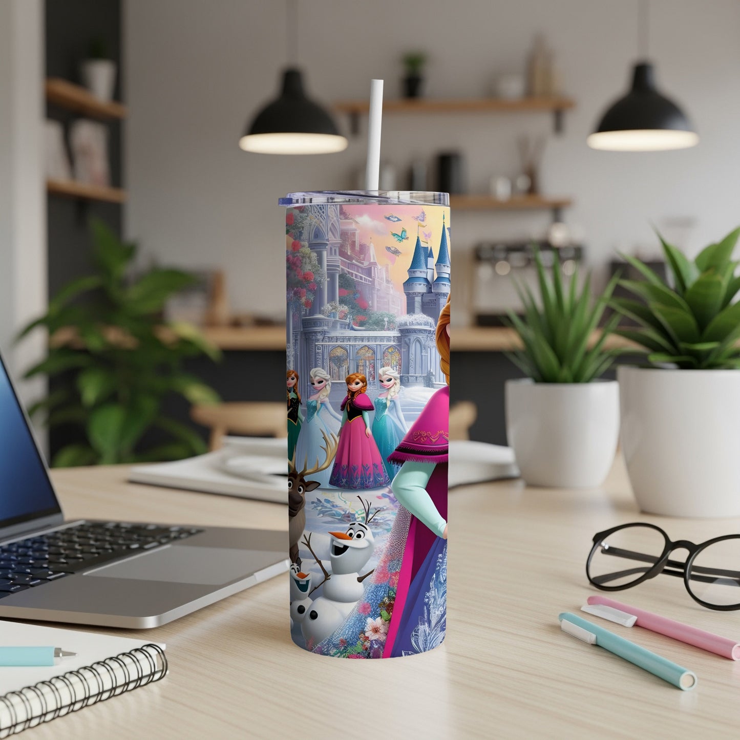 Frozen characters Elsa, Anna, and Olaf on a colorful tumbler.