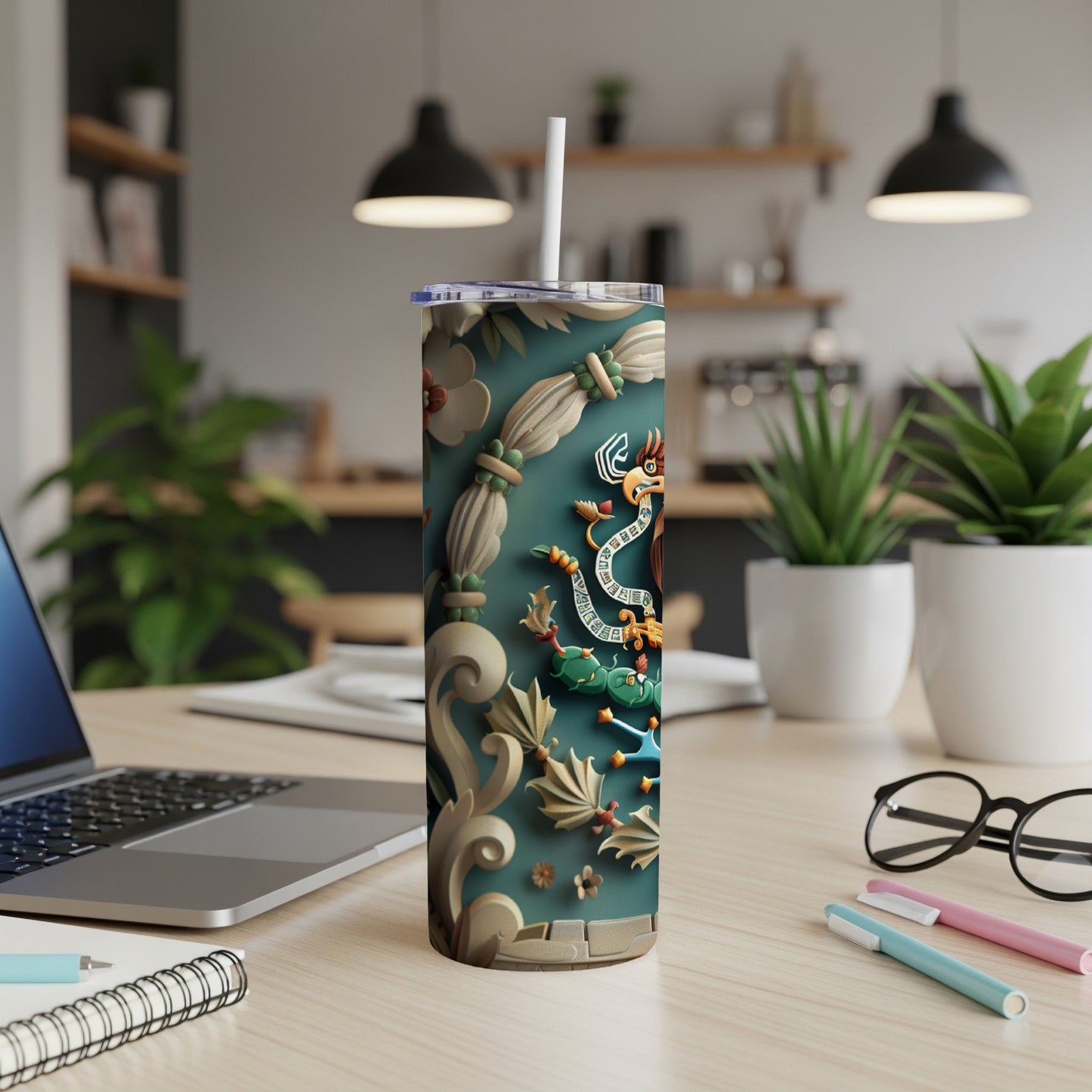 Dragon and floral design on a tall, insulated tumbler with a straw.
