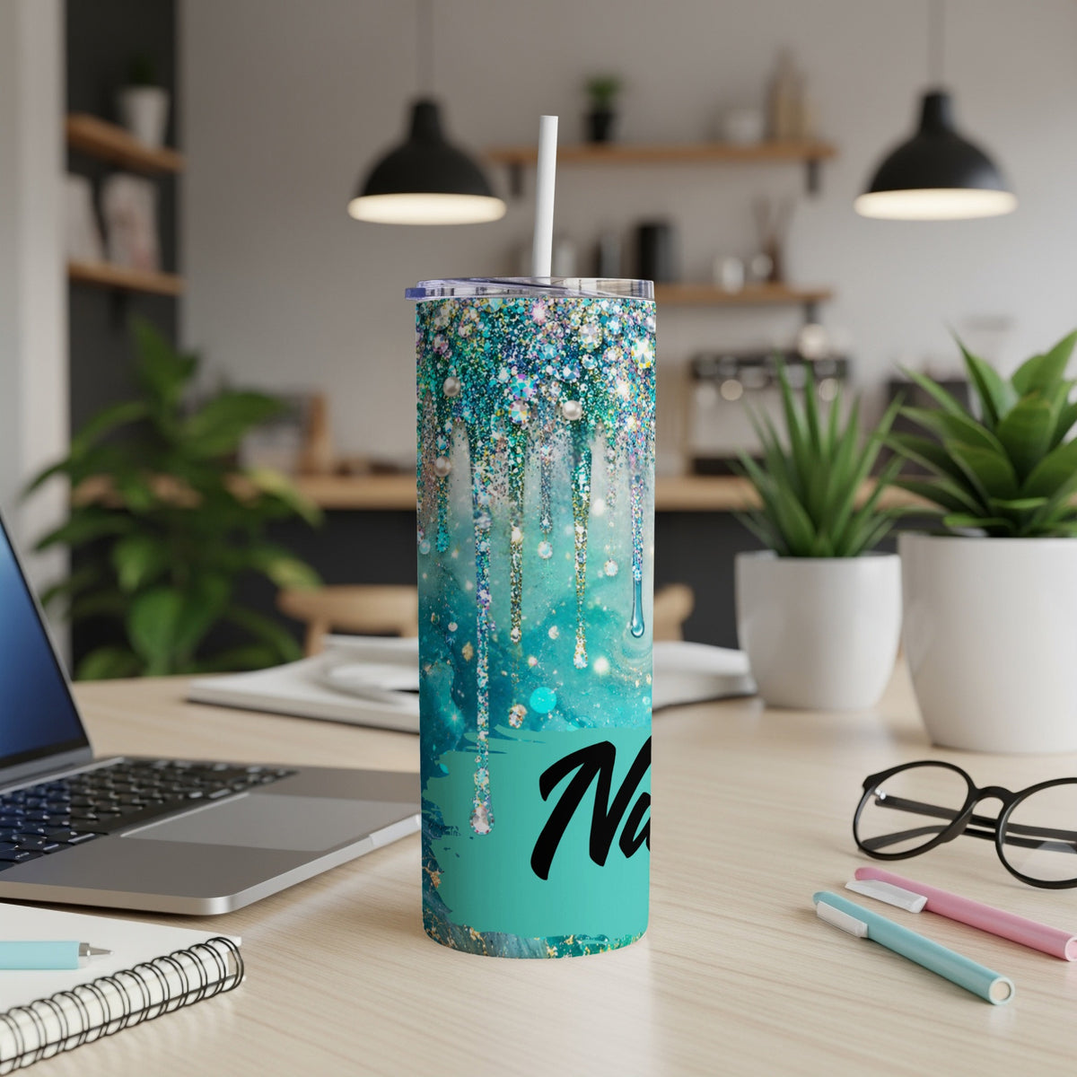 Teal glitter dripping tumbler with the name "Na" in black cursive lettering.