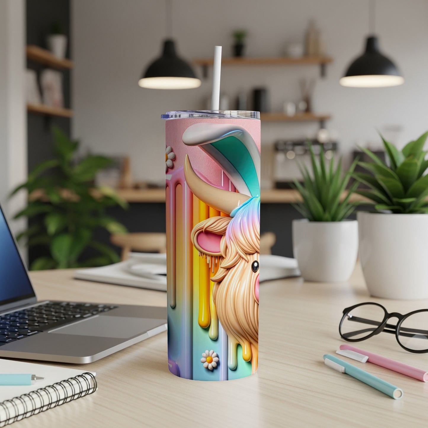 Humorous Highland cow with bunny ears on a colorful, dripping tumbler.