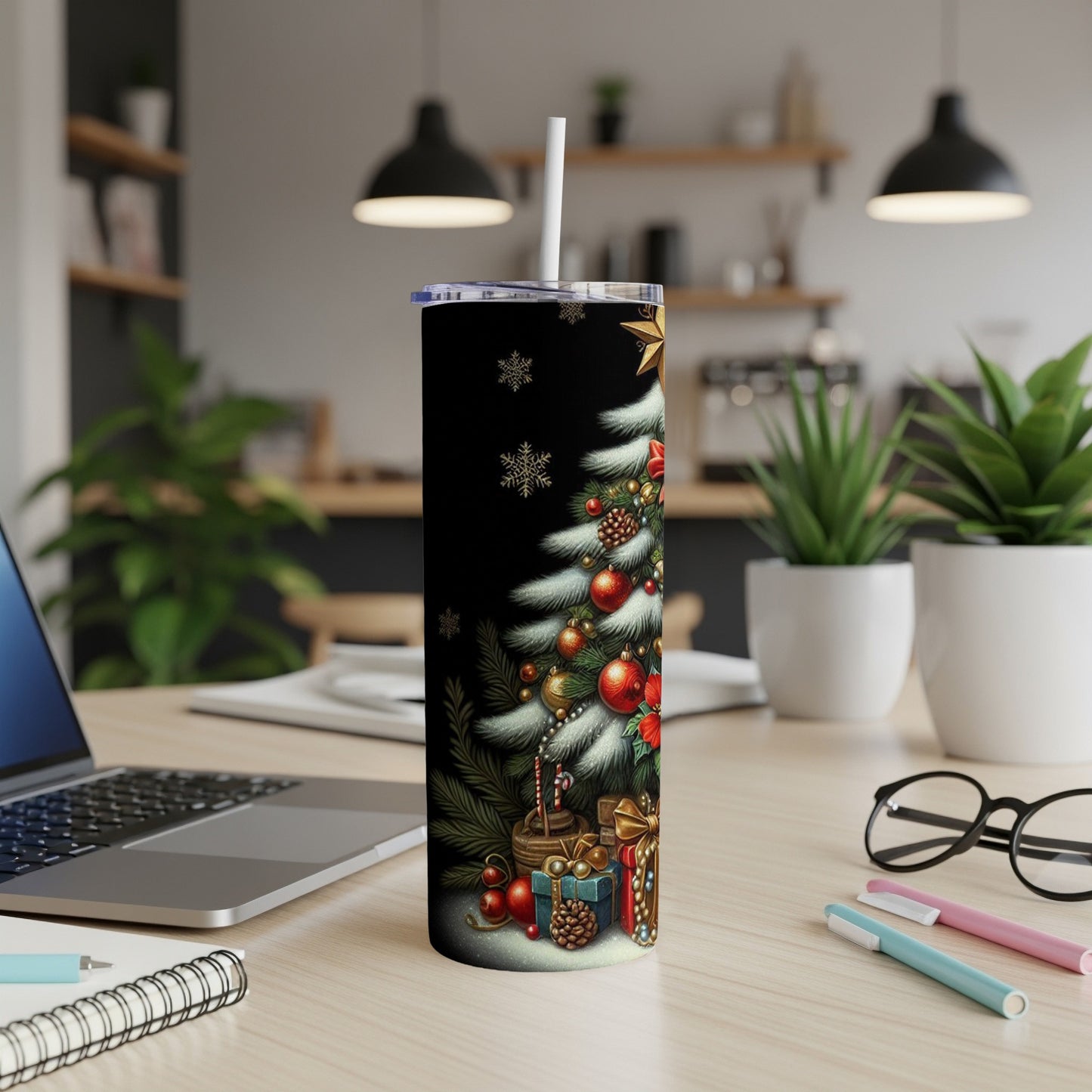 Black tumbler with Christmas tree, ornaments, and gifts design.