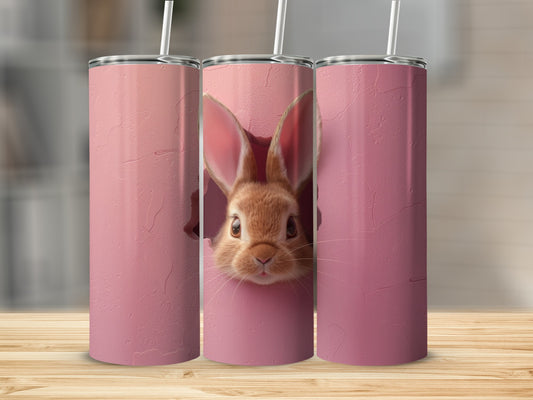 Pink tumbler with a cute bunny peeking out of a cracked eggshell.