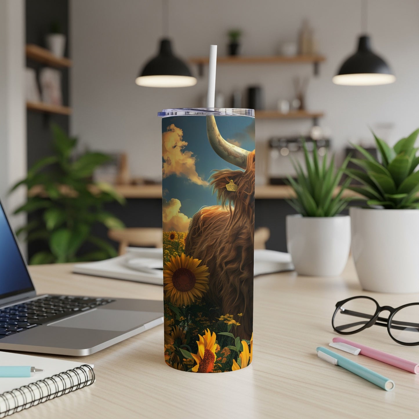 Highland cow with sunflowers on a tall tumbler mug.