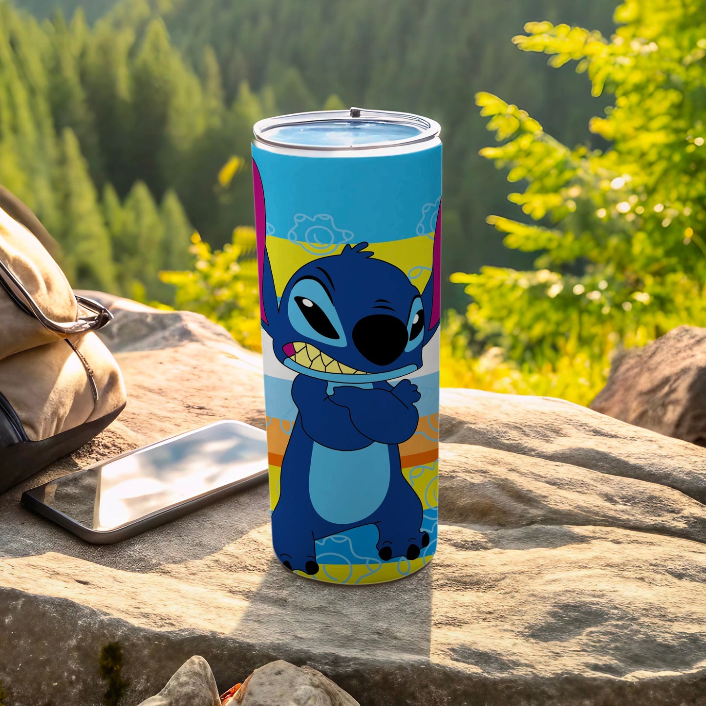 Blue Stitch character on a blue and yellow striped tumbler.