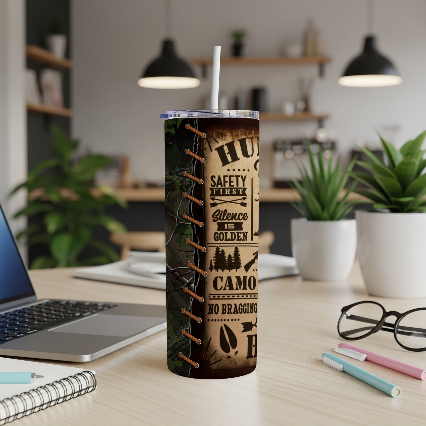 Tumbler with camouflage pattern and text about hunting.