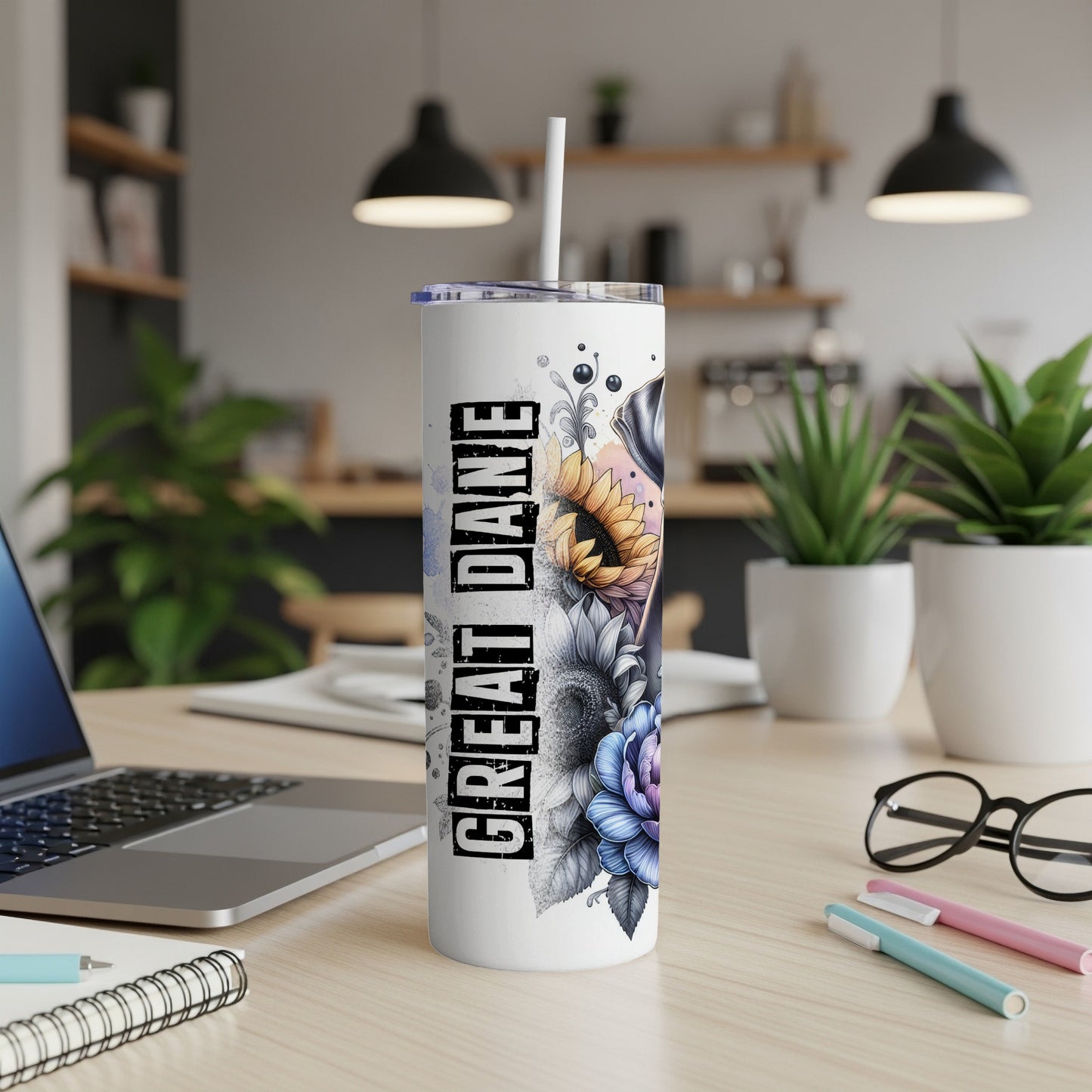 Great Dane tumbler with floral and skull design.