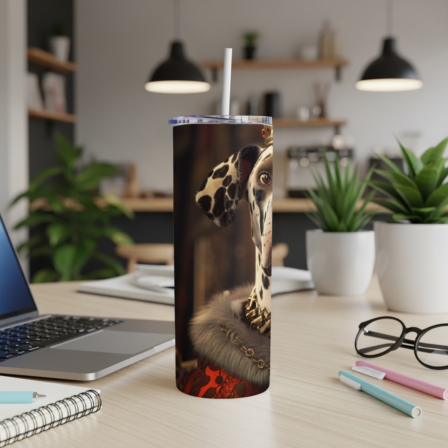 Dalmatian dog wearing a crown and fur collar on a tall tumbler.