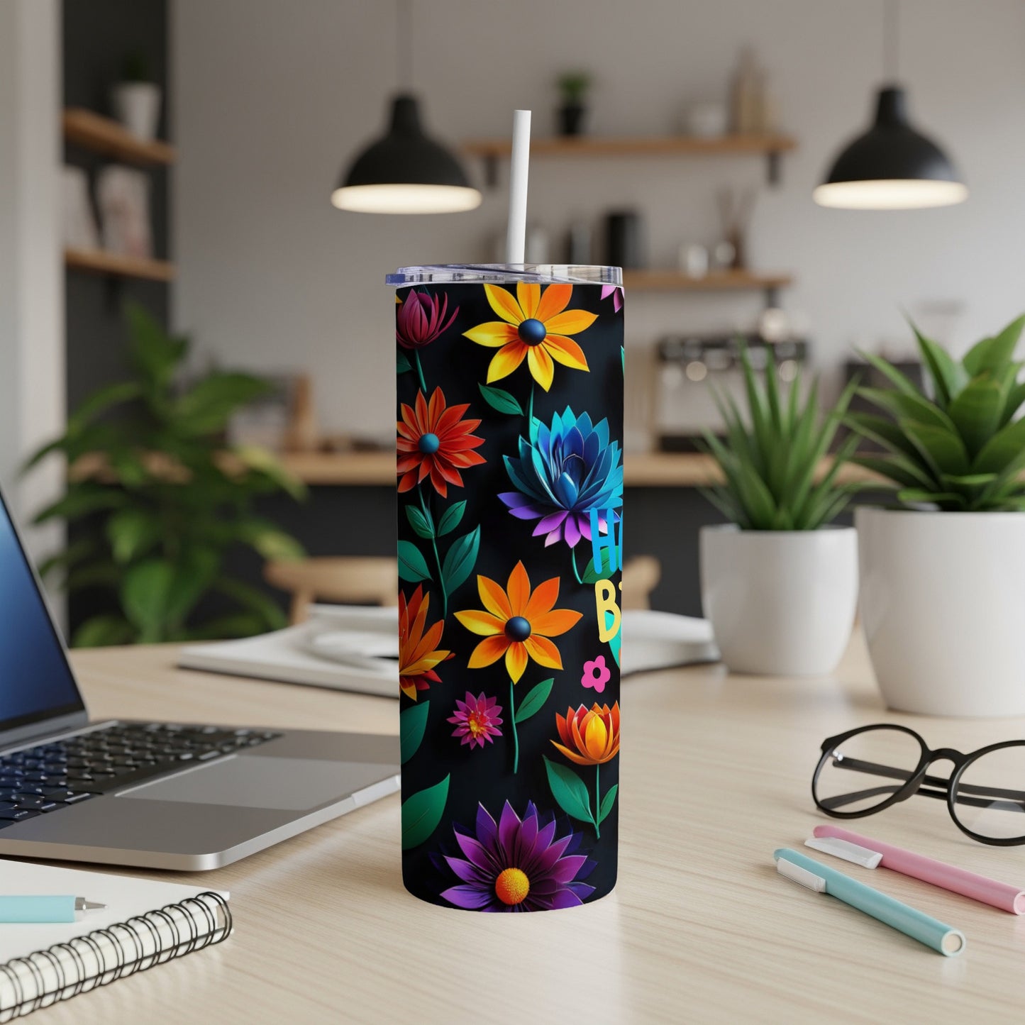 Black tumbler with colorful flowers and "Birthday" text.