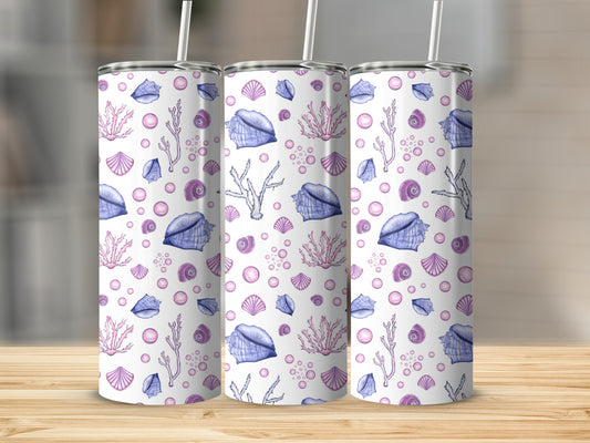 Triptych of tumblers with a repeating pattern of shells and coral.