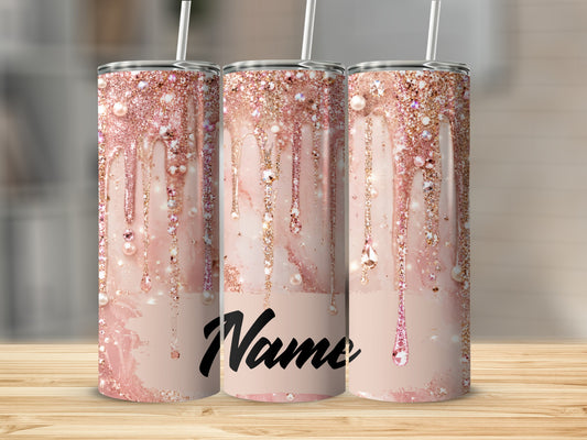 Three tumblers with a pink marble and glitter drip design and a space for personalization.