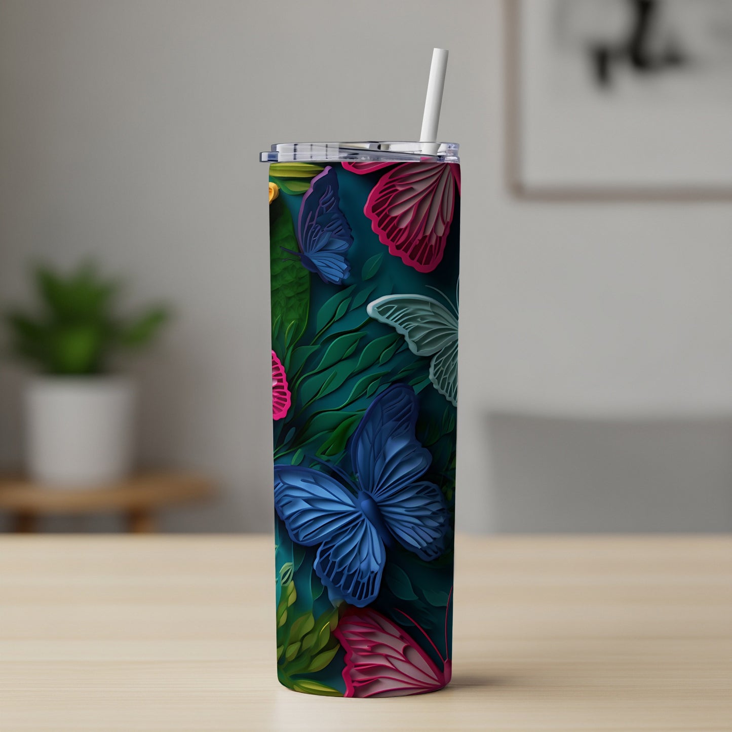 Tall tumbler with colorful butterflies and green leaves design.