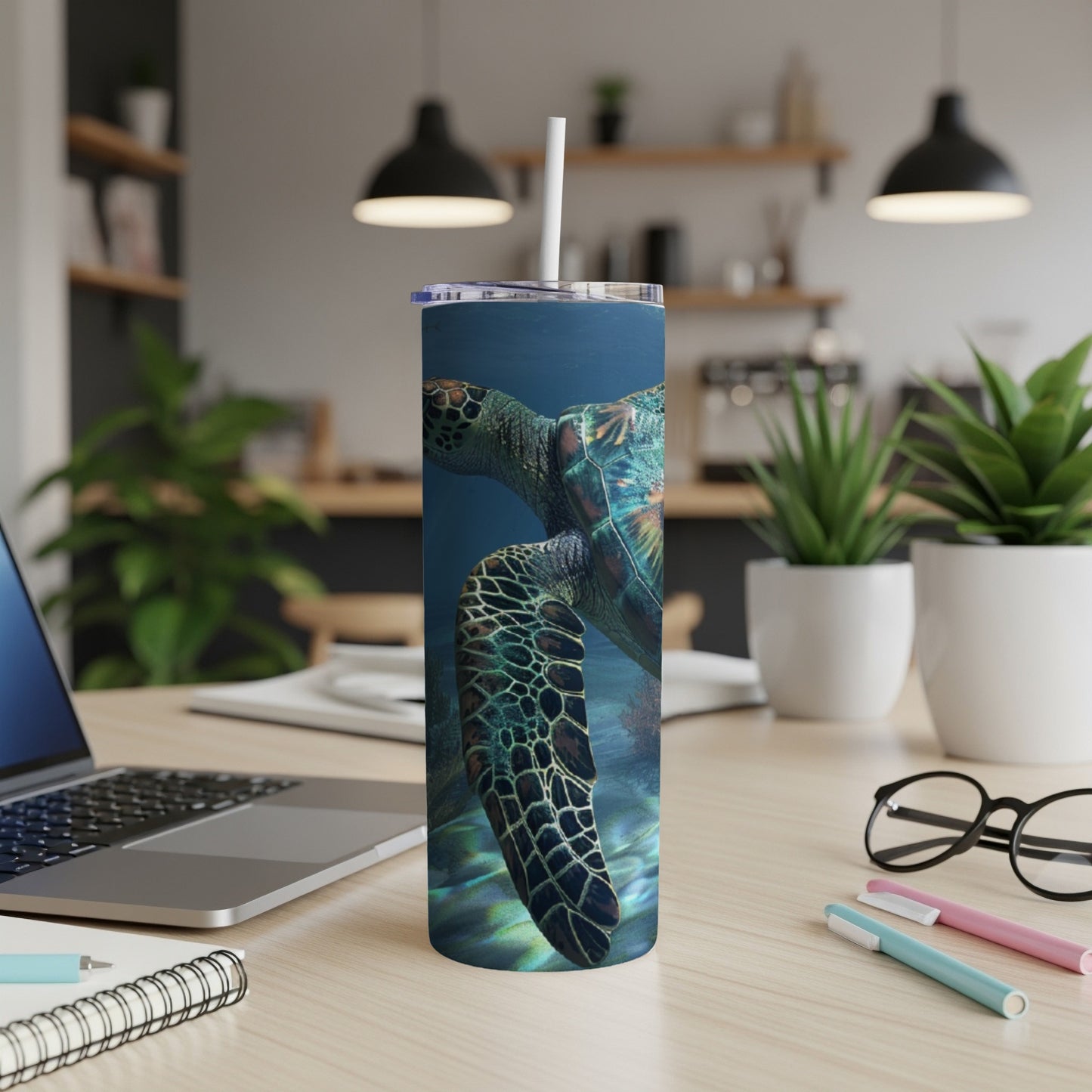 Sea turtle swimming underwater, featured on a stainless steel tumbler.