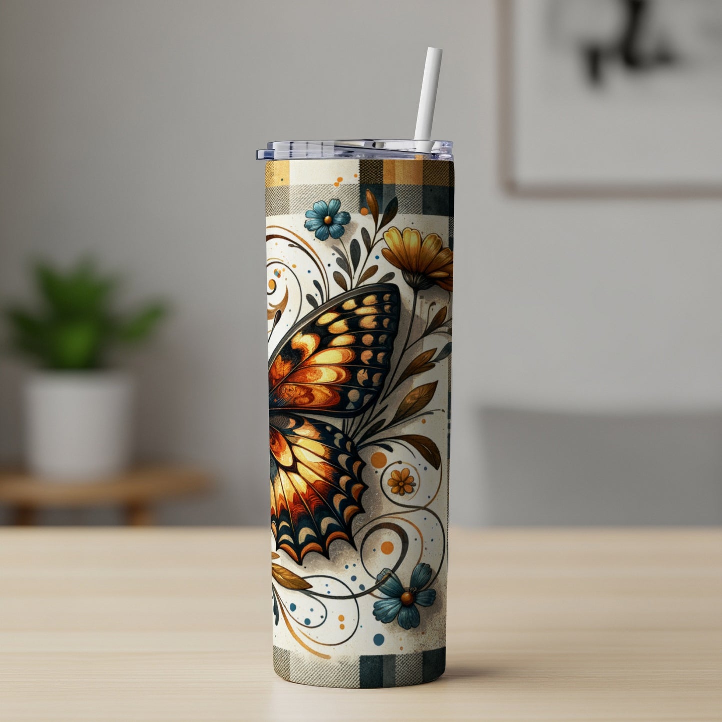 Tall tumbler with a detailed butterfly design and plaid pattern.