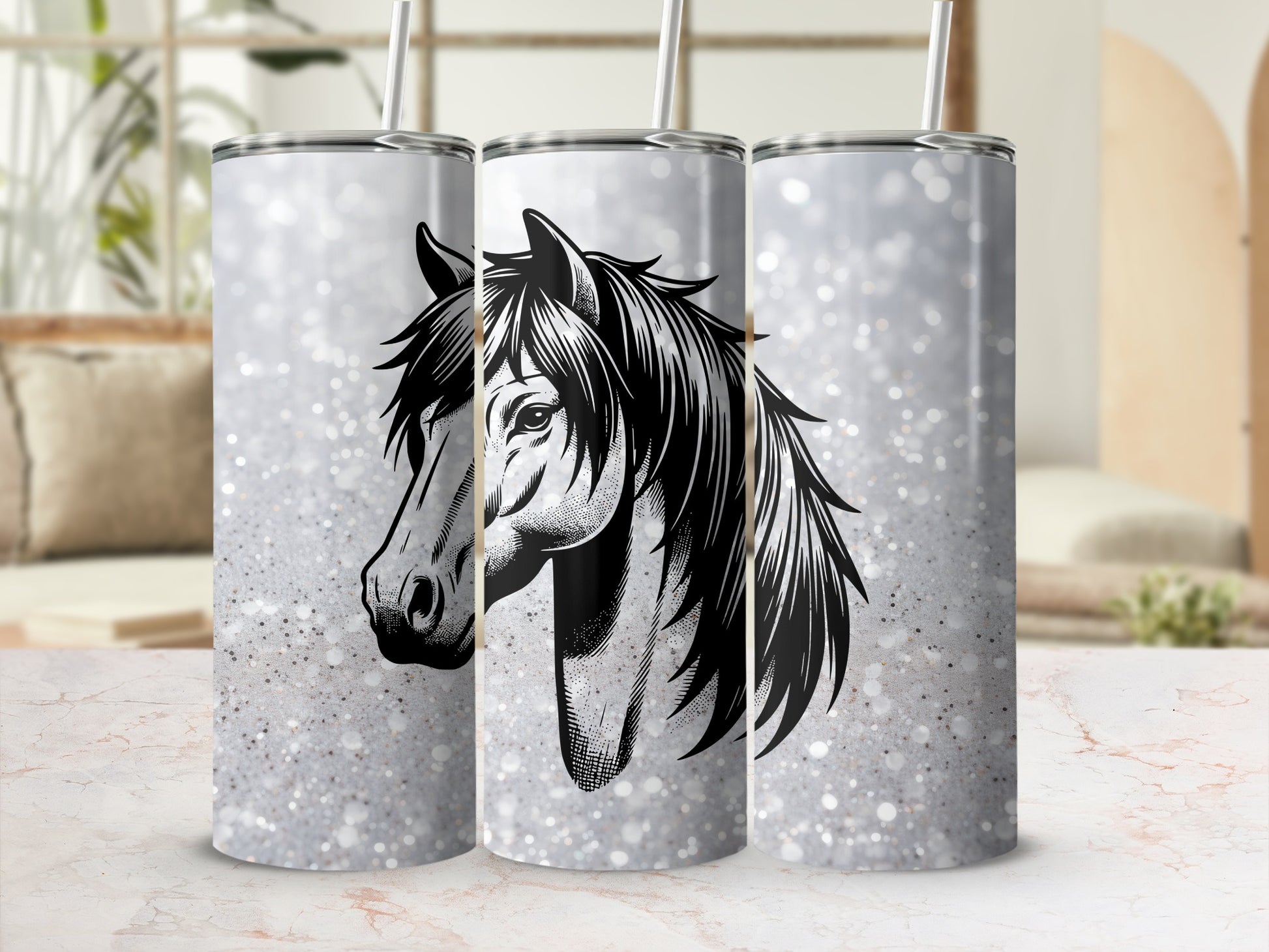 Three tumblers featuring a black and white horse head design on a glitter background.