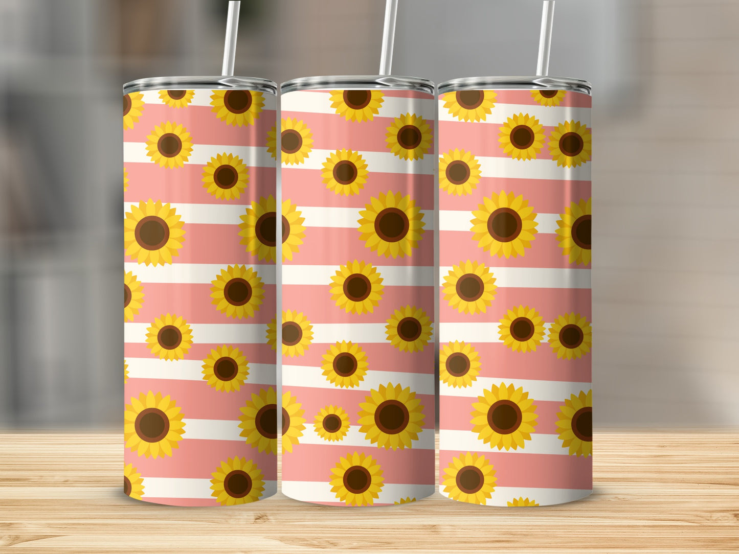 Three tumblers with a pink and white striped sunflower pattern.