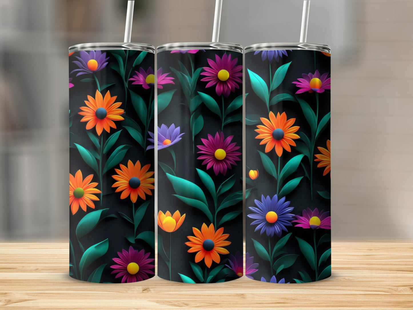 Three tumblers with a floral pattern of orange, purple, and pink flowers.