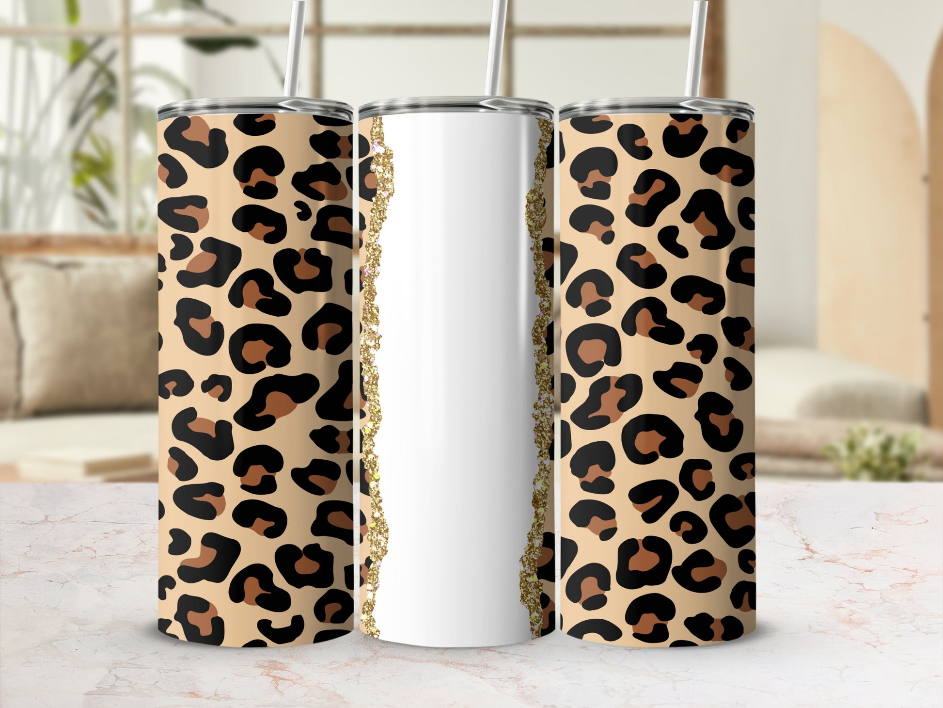Leopard print tumblers with white center panel and glitter accent.