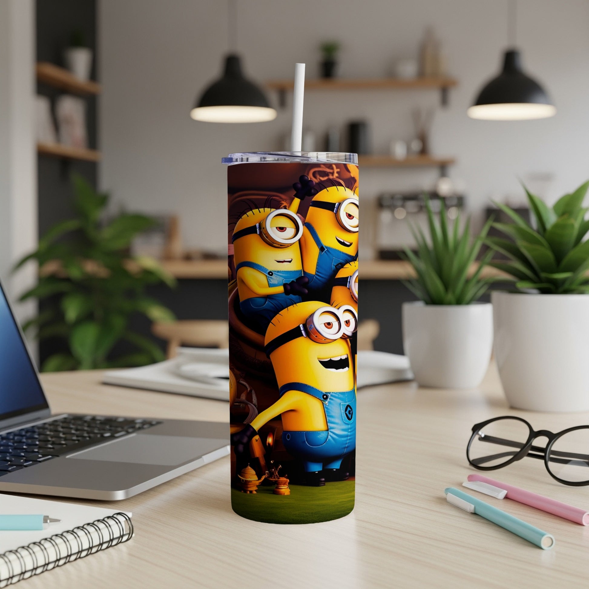 Minions in blue overalls smiling on a tumbler with a straw.