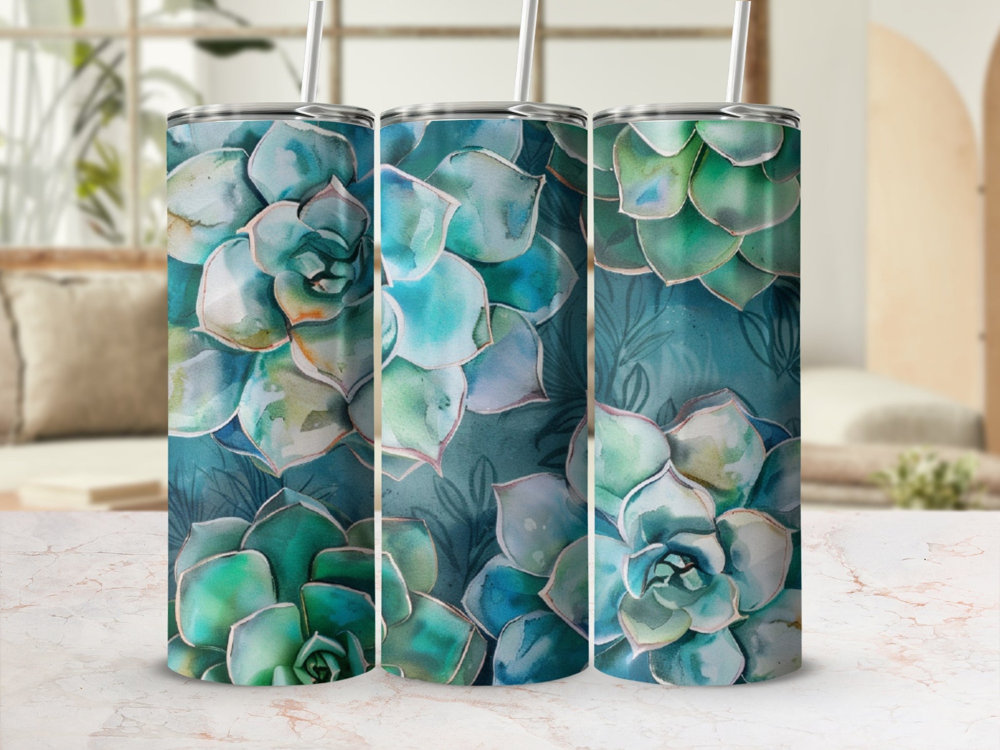 Three tumblers with a watercolor succulent design.
