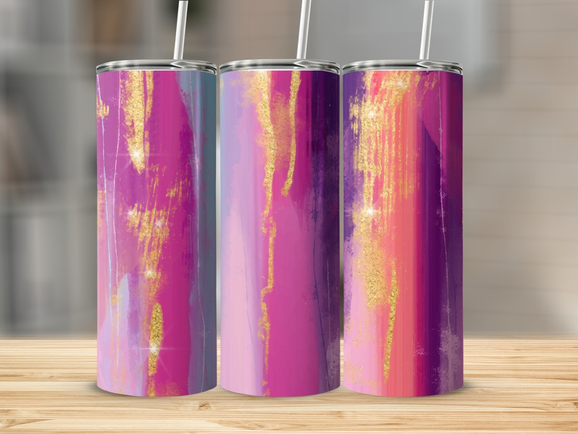 Three tumblers with abstract pink, purple, and gold watercolor designs.