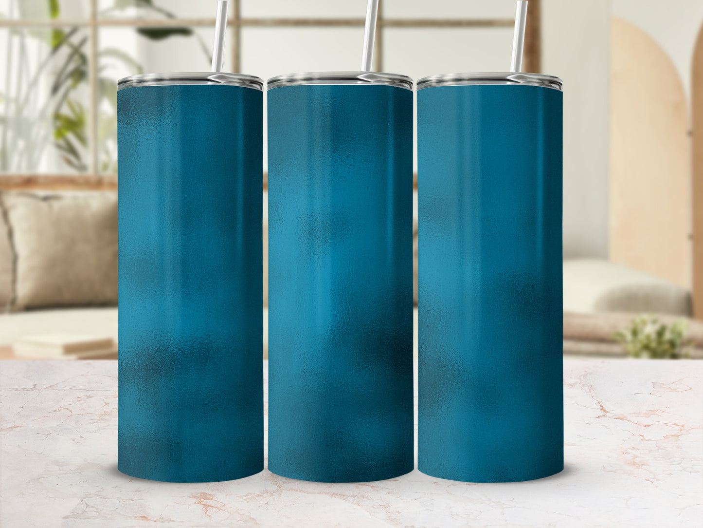 Three teal tumblers with