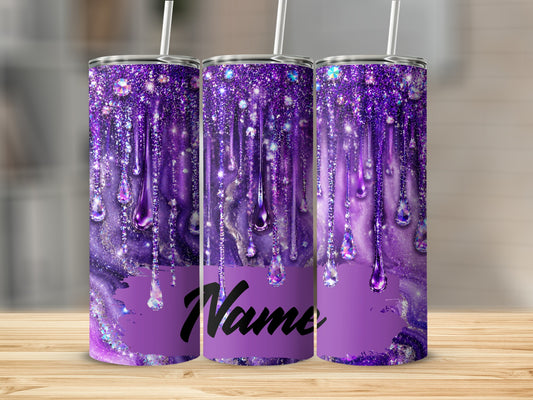 Purple glitter drip tumbler with rhinestones and space for personalization.