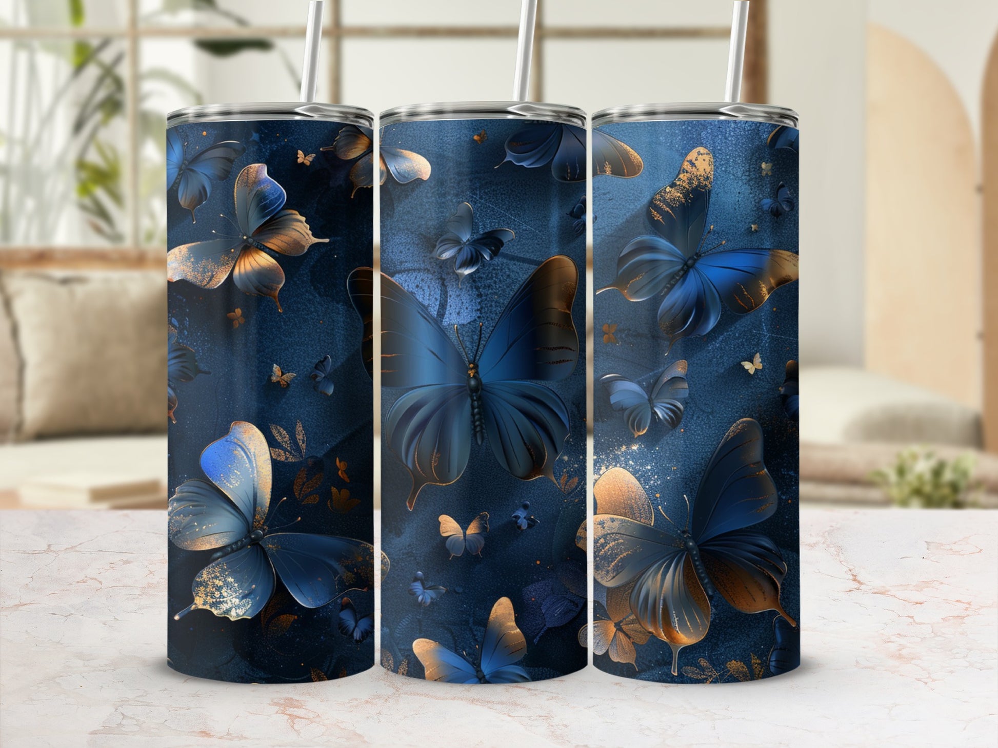 Dark blue tumbler with gold butterflies and floral accents.