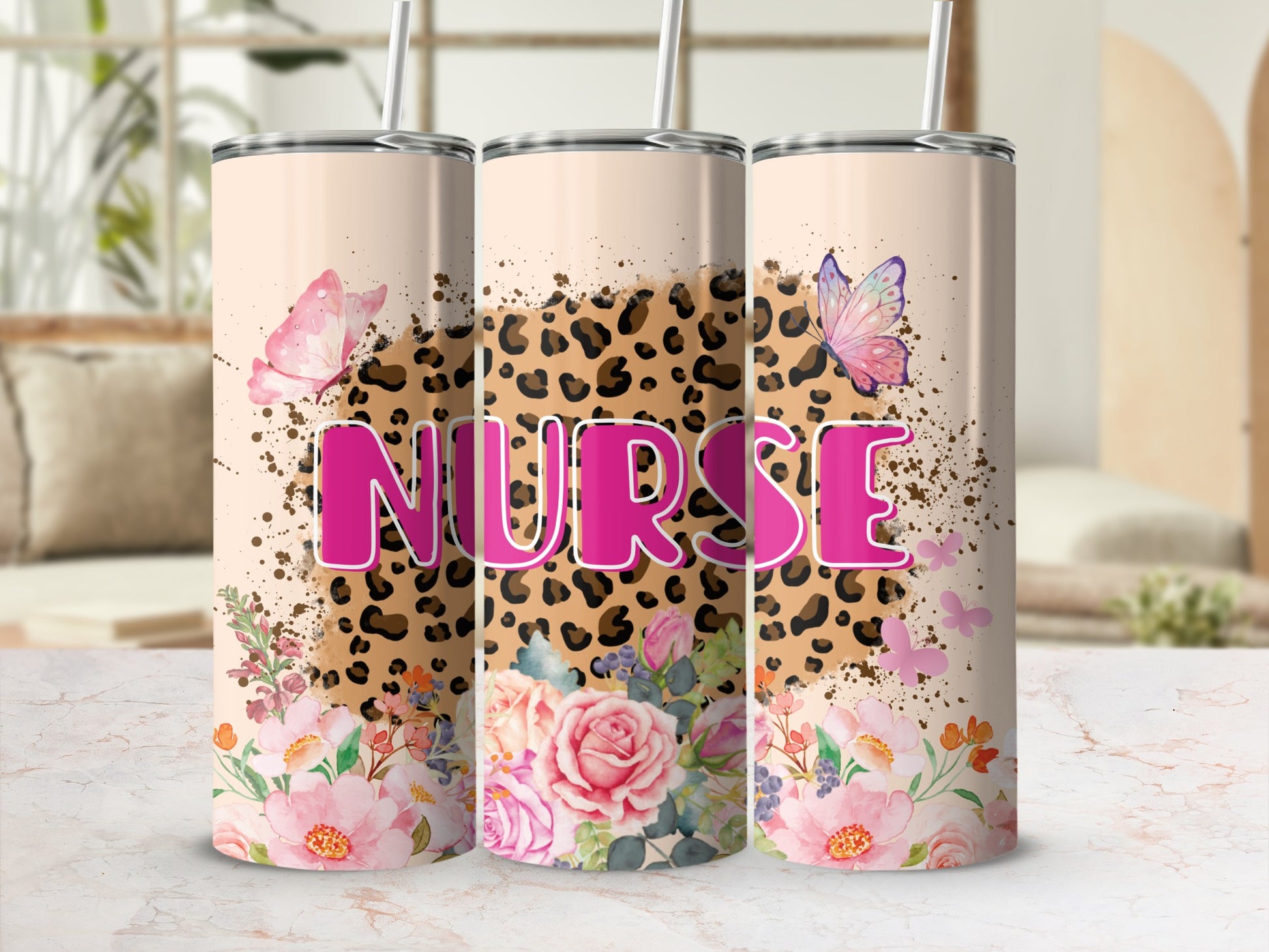 Tall tumbler with "NURSE" text and floral, leopard, and butterfly designs.