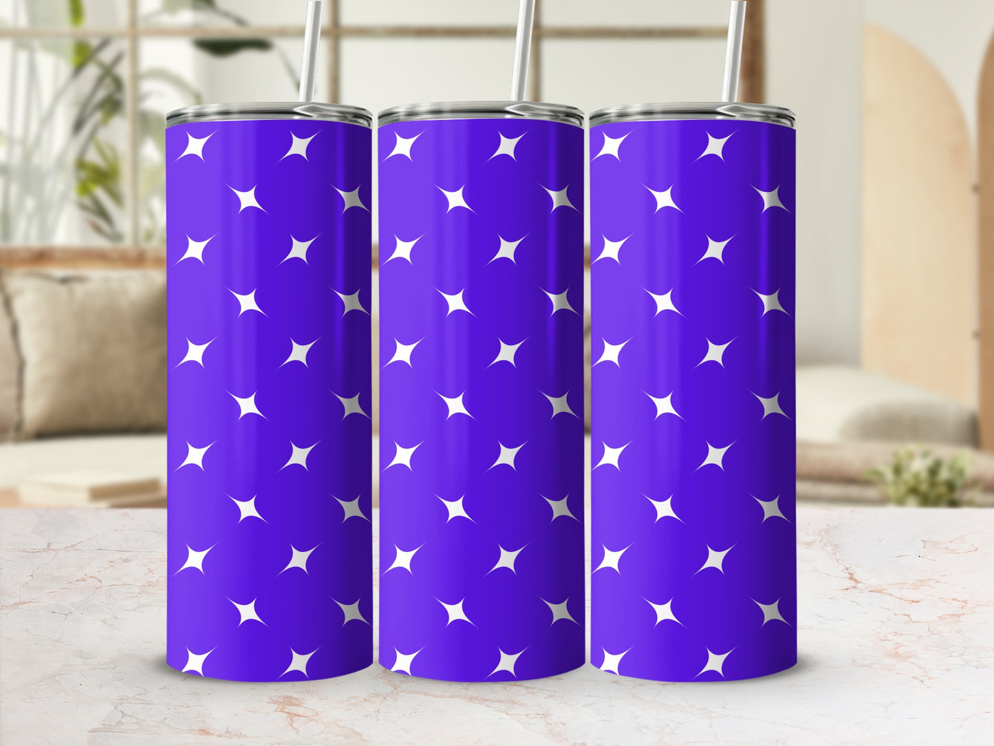 Purple tumbler with white star pattern and straw.