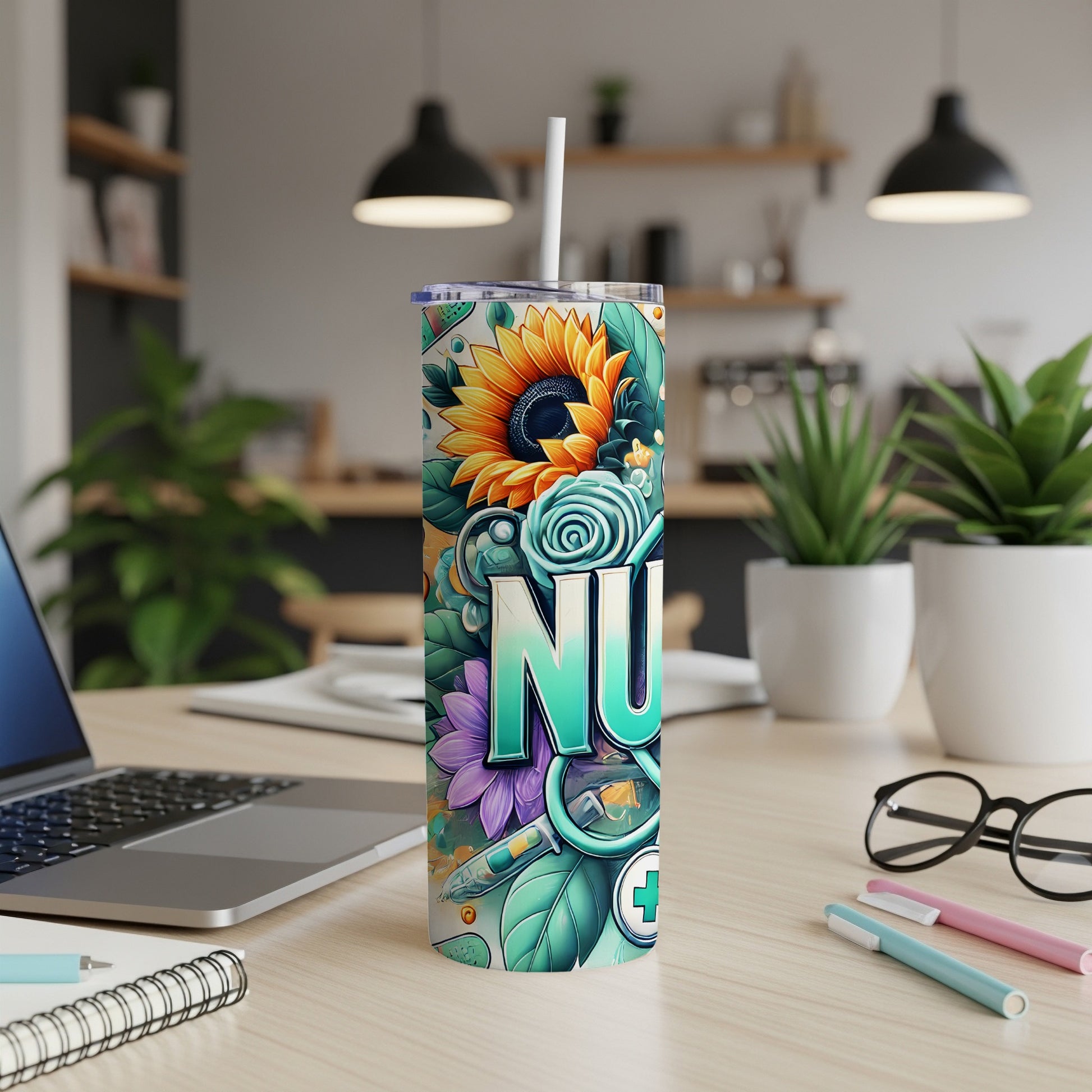 Nurse-themed tumbler with floral and medical icons, on a desk.