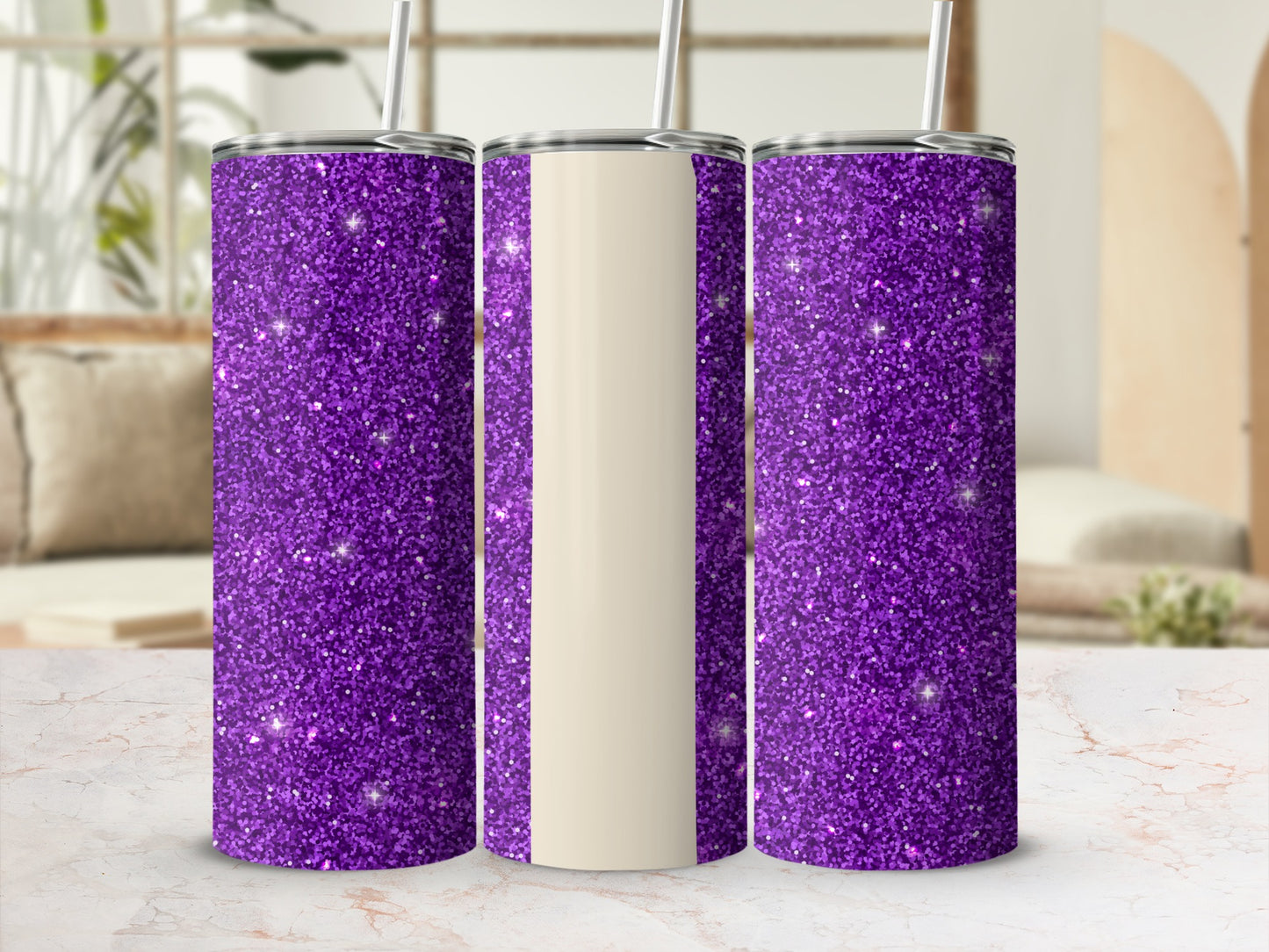Three glittery purple tumblers with cream sections and straws.