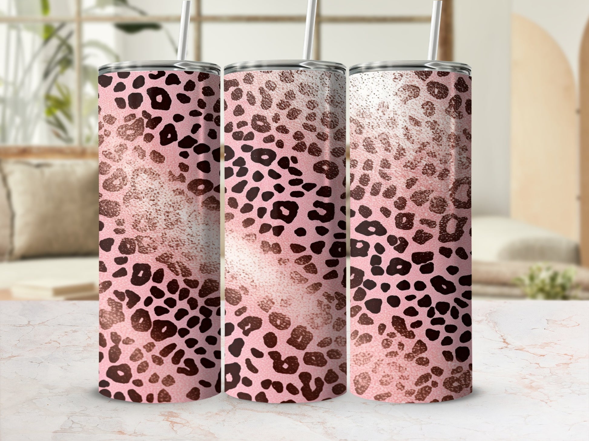 Three tumblers with a pink leopard print pattern and textured rose gold accents.
