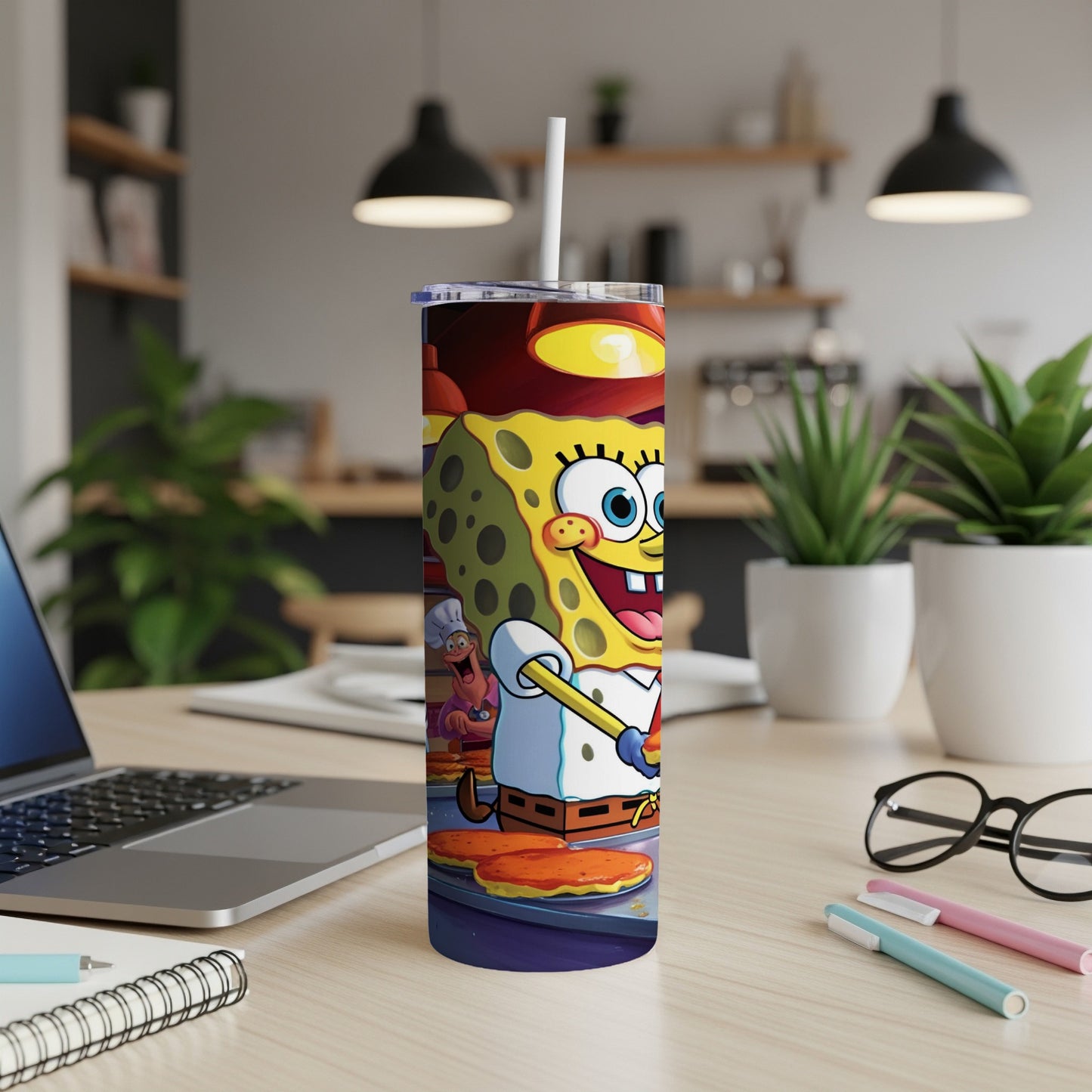 SpongeBob SquarePants on a tumbler, making pancakes in a kitchen.
