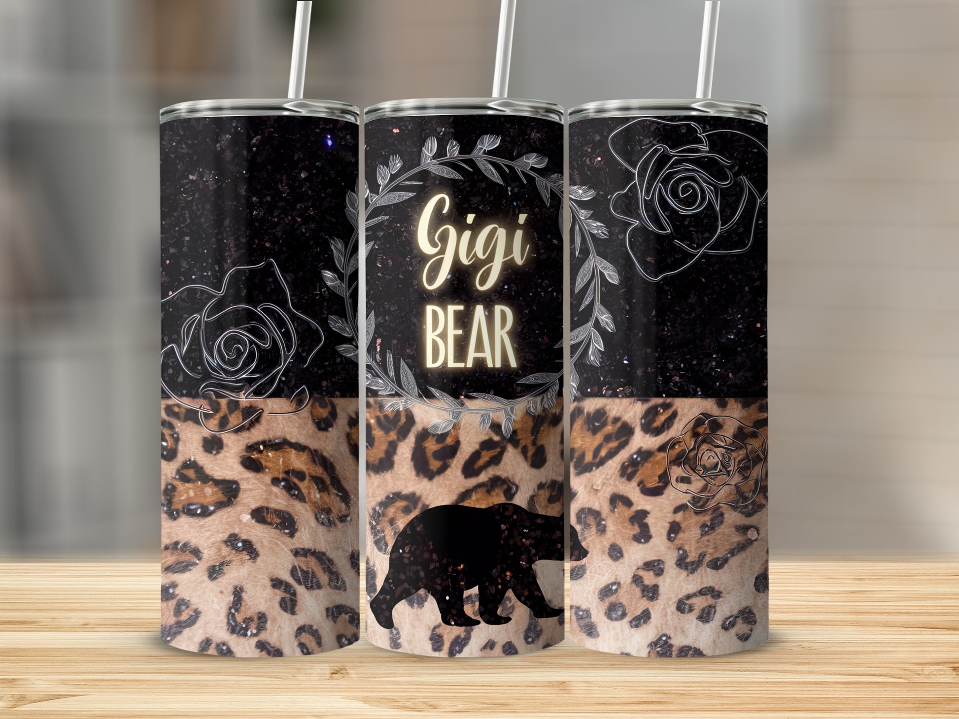 Gigi Bear tumbler with leopard print and floral accents.
