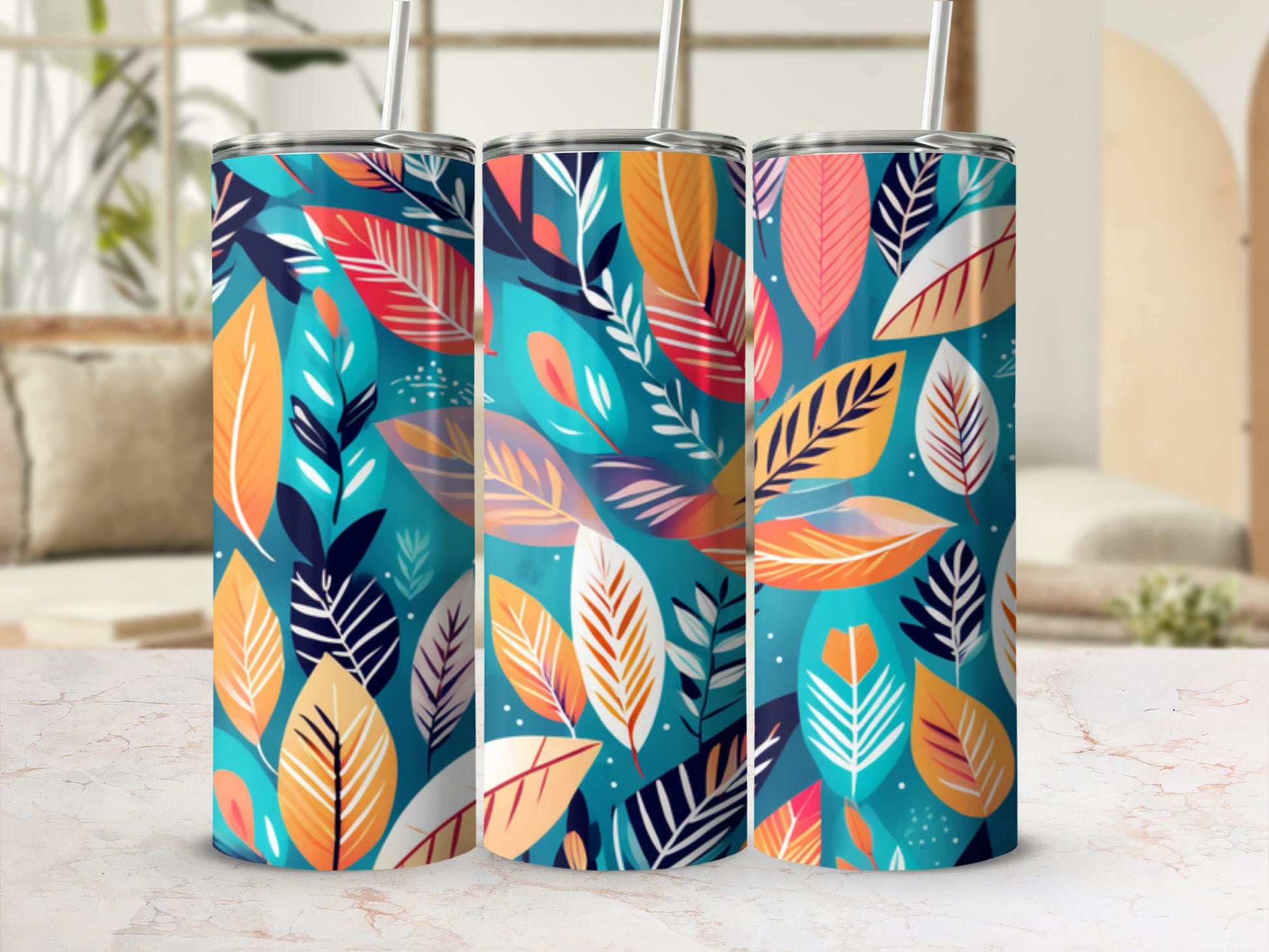 Three tumblers with a colorful abstract leaf pattern.