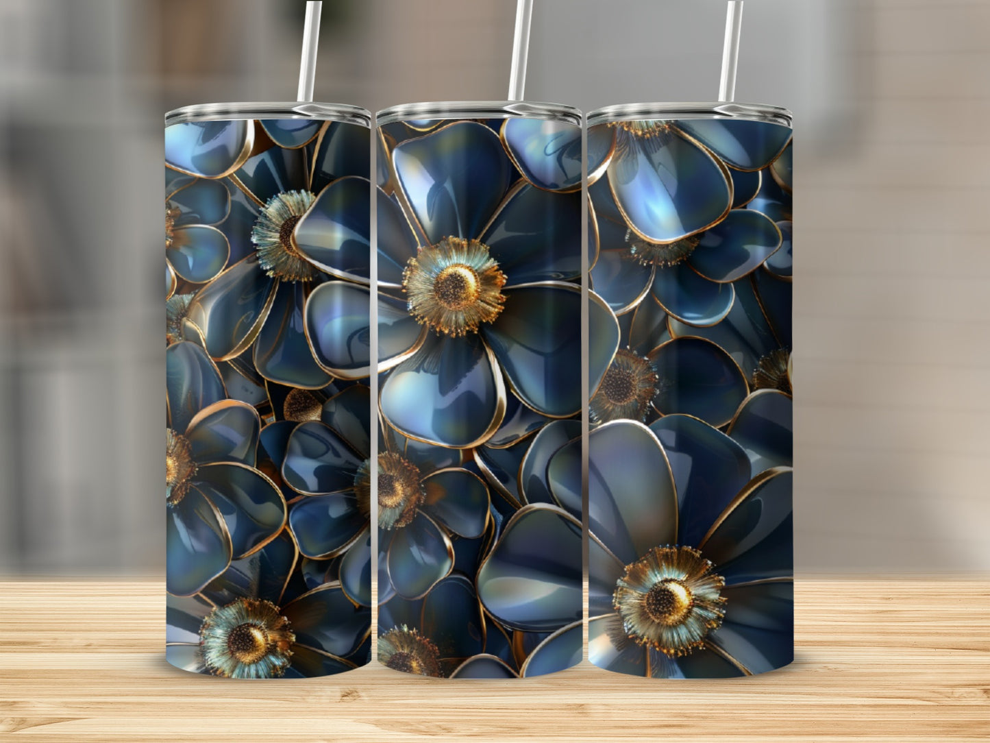 Three tumblers with a deep blue floral pattern and gold centers.