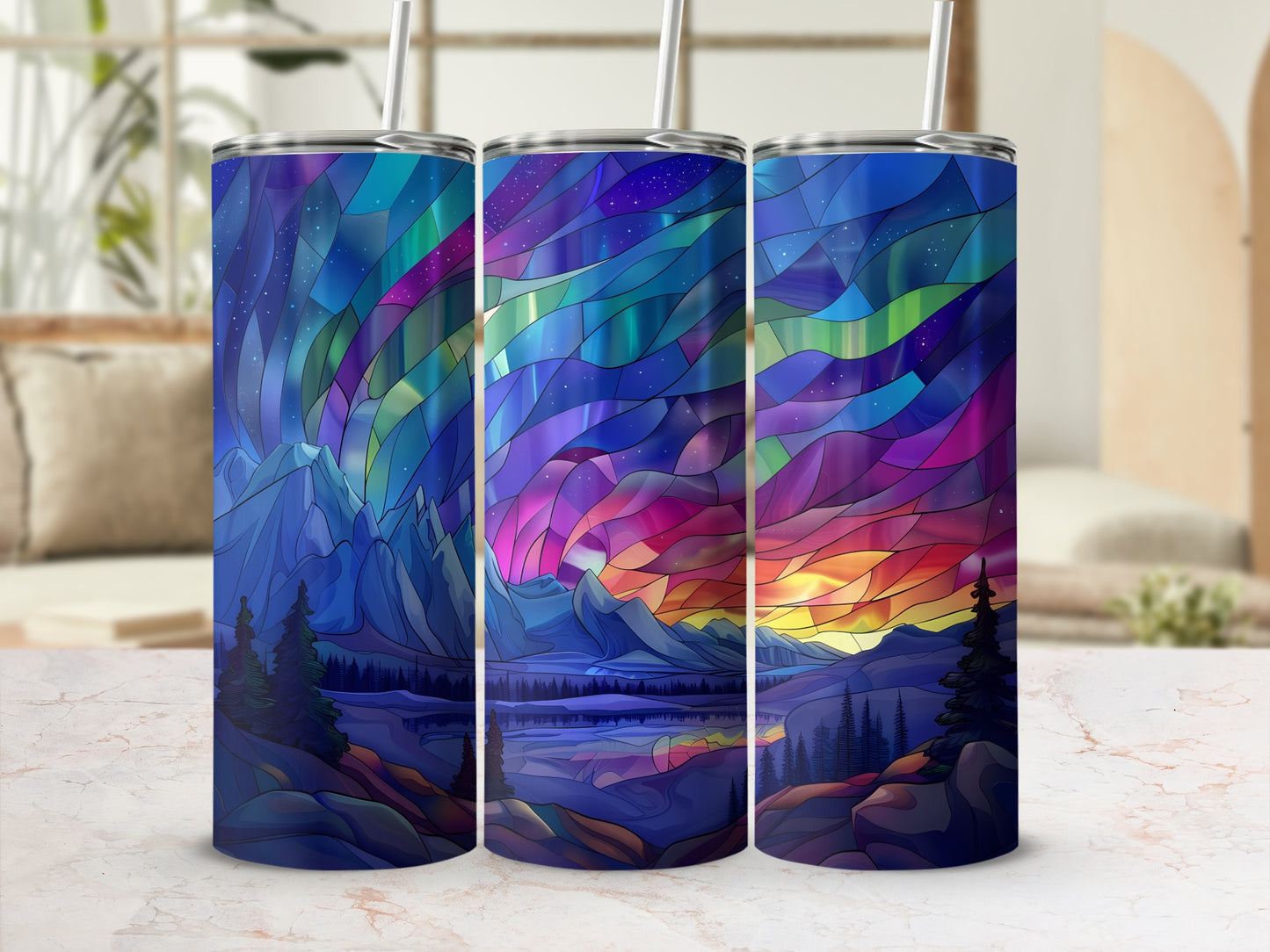 Triptych of tumblers with aurora borealis stained glass mountain landscape design.