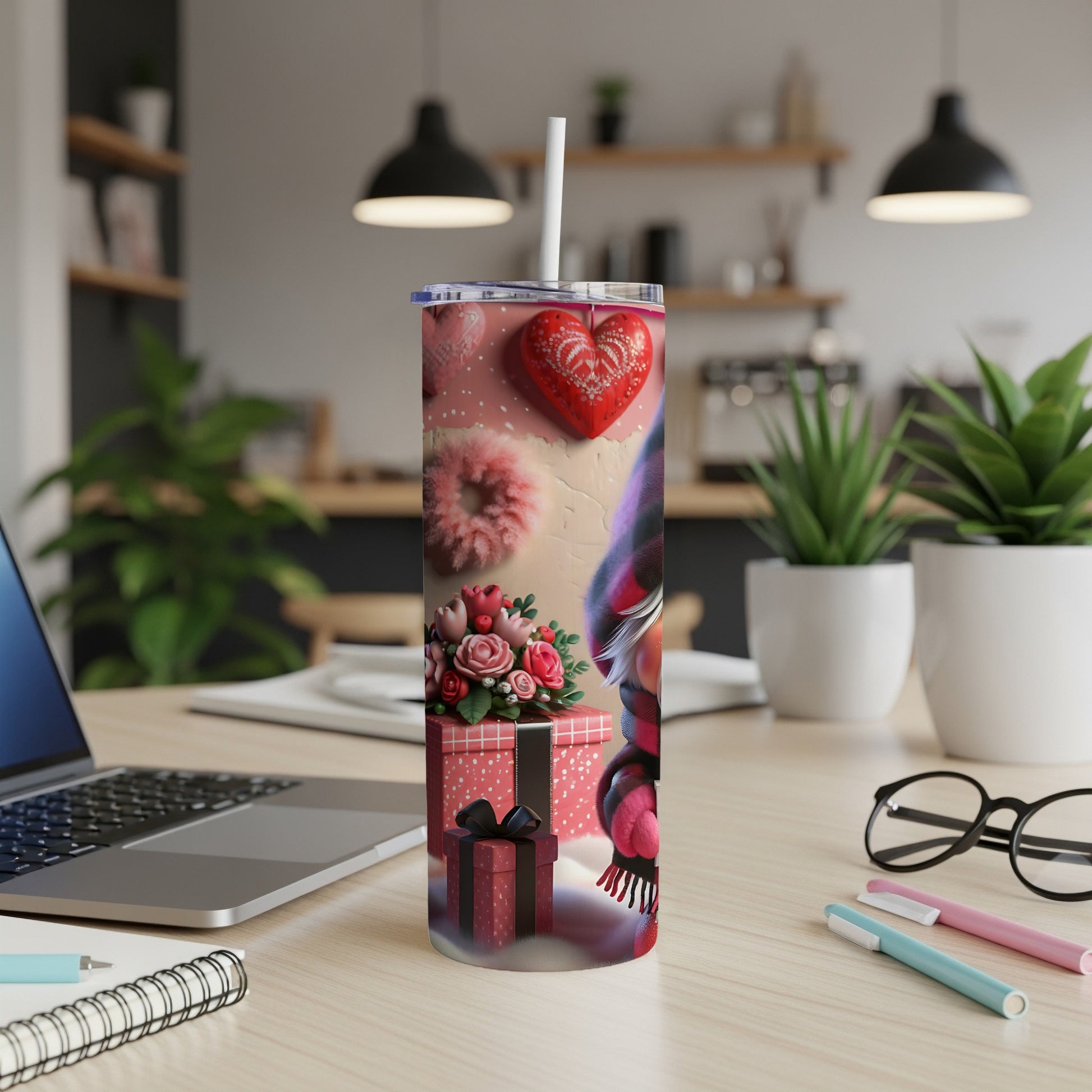 Tumbler with pink, red, and white heart pattern and gnome illustration.